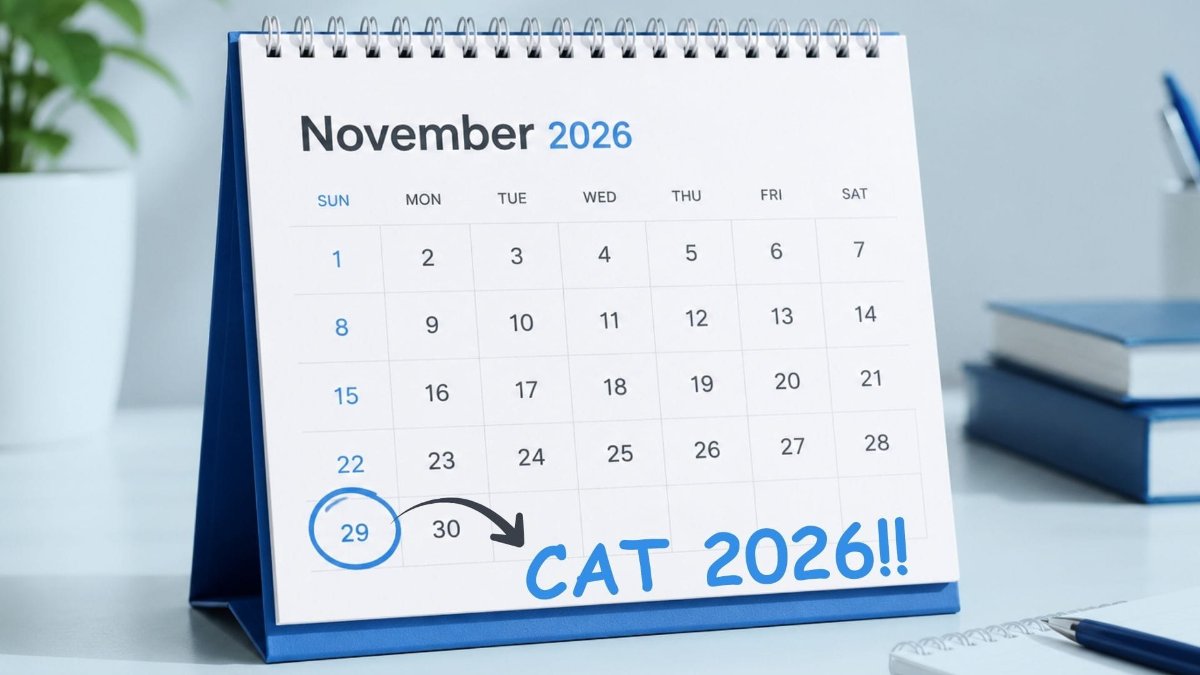 A study desk with a calendar marked with 29 November showing a five-month CAT 2026 preparation plan.